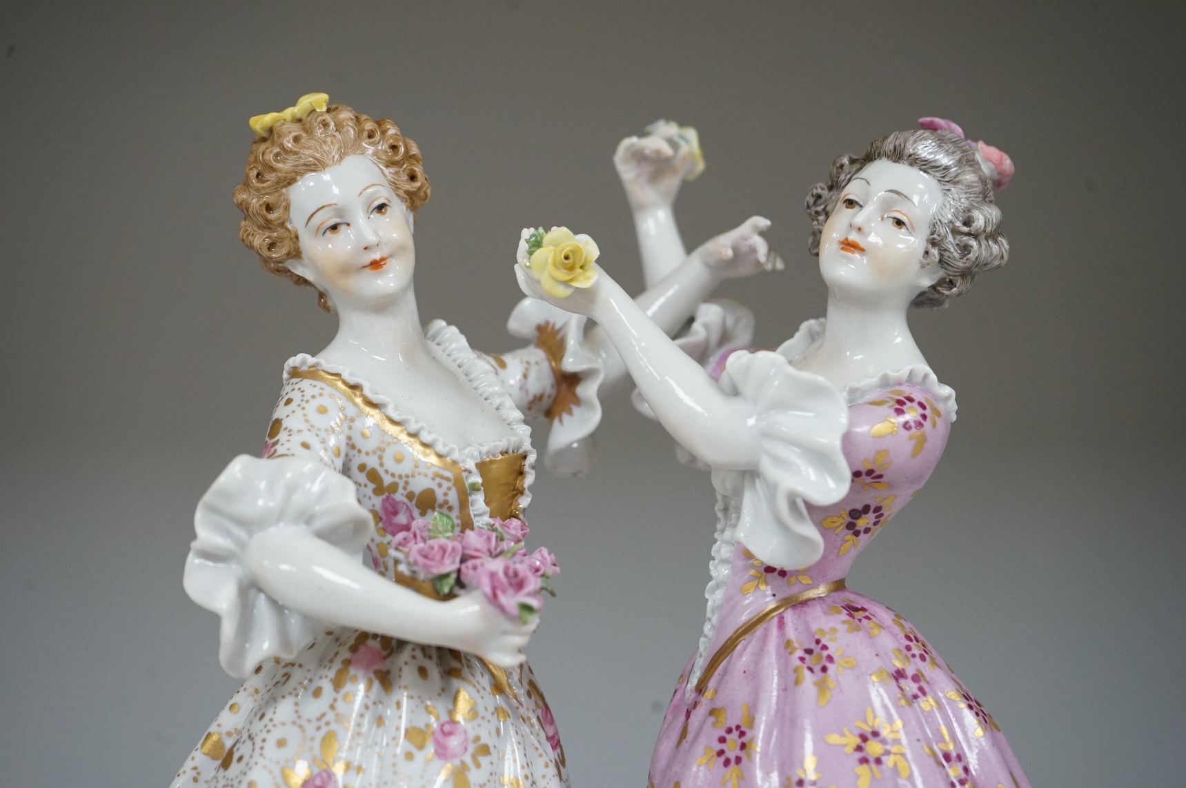 A Continental porcelain group of two dancers, 20cm high